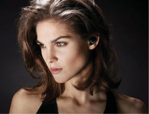 The Bragi miniature earphone, in the lady’s ear, is also a complete music storage device powered by a rechargable VARTA Microbattery. The unit provides inspiration for small medical devices.