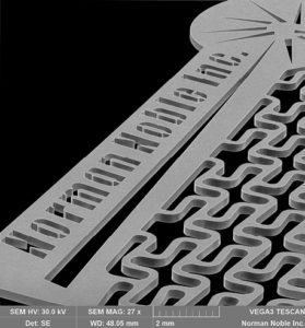 SEM image of athermal lasermachining of flat nitinol. 