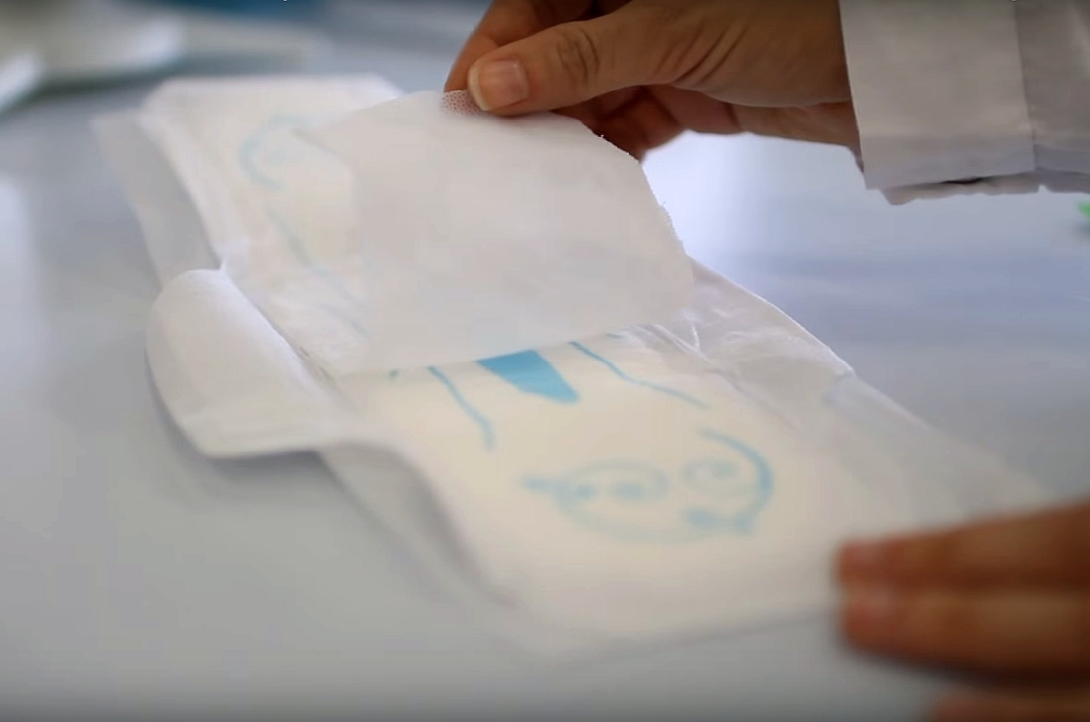 Microfiber Pad Draws Urine Samples from Absorptive Pads in Seconds