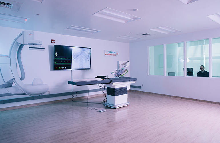 A surgical robotics system in a room for demonstrations