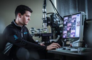 Engineer using a computer to view images 