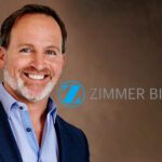 A portrait of Zimmer Biomet CEO Bryan Hanson