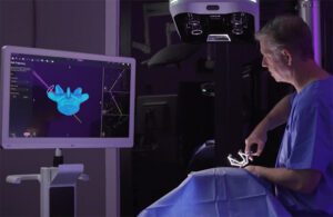 A surgeon using the Proprio Paradigm system to visualize a spine surgery.