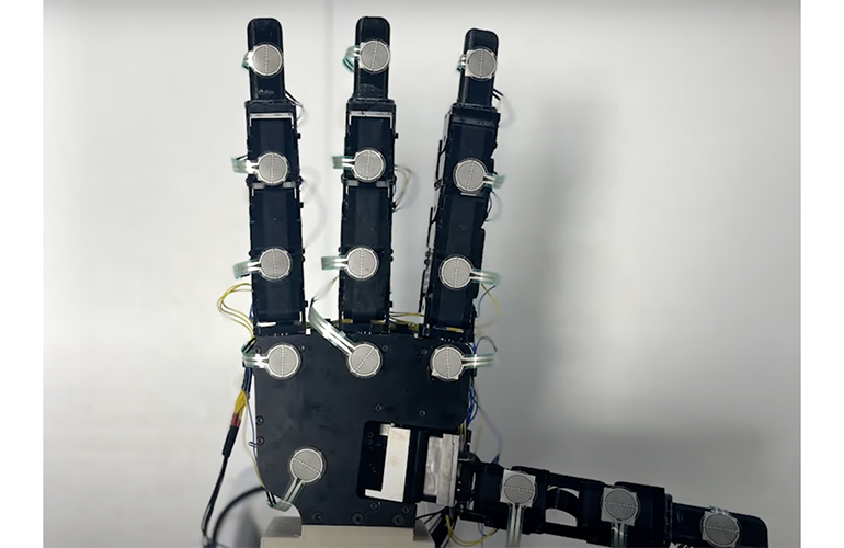 Robotic hand uses low-cost touch sensors instead of vision
