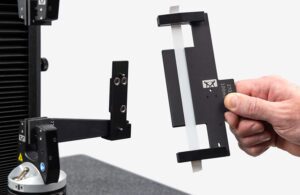 A photo of Instron's Precision Specimen Loader.