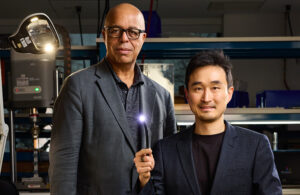 Medtronic Chief Technology and Innovation Officer Ken Washington and Medtronic Endoscopy Chief AI Officer Ha Hong pose with a scope used with the GI Genius Intelligent Endoscopy Module at the company's facilities in Santa Clara, California.