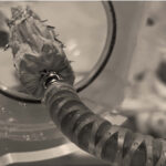 A photo showing the articulated end of Capstan Medical's delivery catheter and the compressed mitral valve implant.