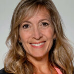 A portrait of The Mullings Group VP and Senior Partner Holly Scott.