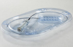 A photo of a Plastic Ingenuity thermoformed PETG package with Tyvek lid, a standard sterile barrier system for medical devices.