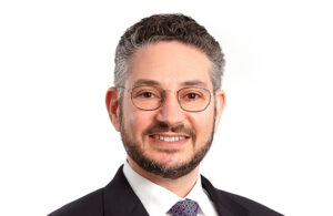 This is a portrait photo of Scott Herskovitz, former CEO of Qosina and now president and board chairperson of the company.