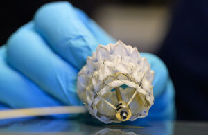 A photo of a heart valve implant developed by structural heart surgical robotics startup Capstan Medical.