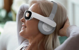 A photo of an Alzheimer's disease patient wearing a Cognito Therapeutics Spectris headset.