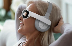 A photo of an Alzheimer's disease patient wearing a Cognito Therapeutics Spectris headset.