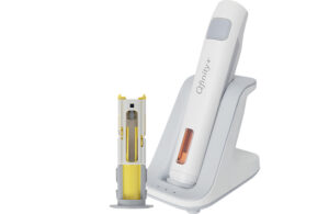 An image showing the Qfinity reusable autoinjector with its hub and a cartridge.