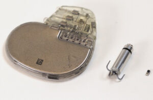 A photo showing how much smaller the injectable pacemaker is than currently available pacemakers.