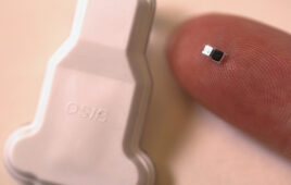 A photo of the Northwestern University pacemaker surrounded by grains of rice for scale [Photo courtesy of Northwestern]