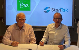 A photo of Steri-Tek CEO Larry Nichols and IBA Deputy CEO Henri de Romrée