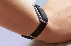 A photo of the Aktiia G0 Blood Pressure Monitoring System on a patient's wrist.