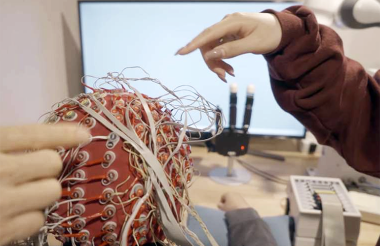 Carnegie Mellon University EEG-based BCI to control robotic hand