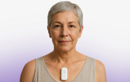 A photo of a patient wearing the Cardiosense CardioTag noninvasive heart monitor.