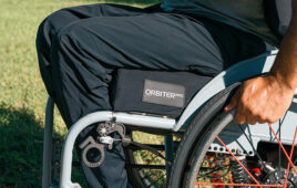 A photo of Kalogon Orbiter Med wheelchair cushion for pressure management.