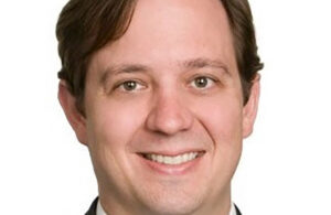 A headshot photo of Accendra Health EVP, General Counsel and Corporate Secretary Heath Galloway.