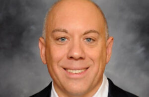 A photo of Former Baxter EVP and CFO Joel Grade.