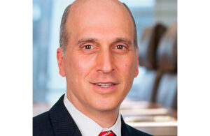 A photo of Henry Schein EVP and COO Michael Ettinger.