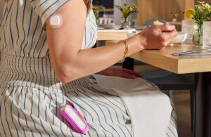 MiniMed Flex insulin pump system worn on the arm.