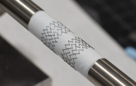 A photo of nitinol and ePTFE on a mandrel.