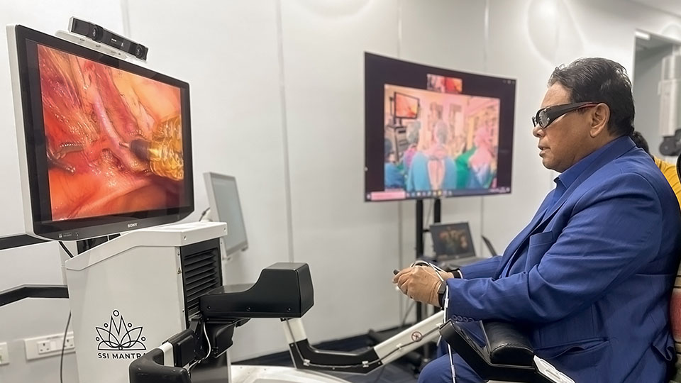 A photo of SS Innovations founder and CEO Dr. Sudhir Srivastava performing a remote procedure using the Mantra 3 system.