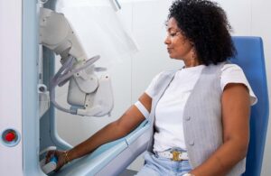 A patient uses Vitestro's robot blood draw device Aletta.